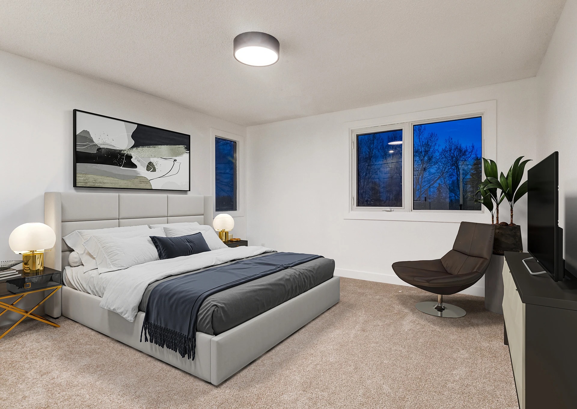 Bedroom with layered abstract art and gold accent pillows