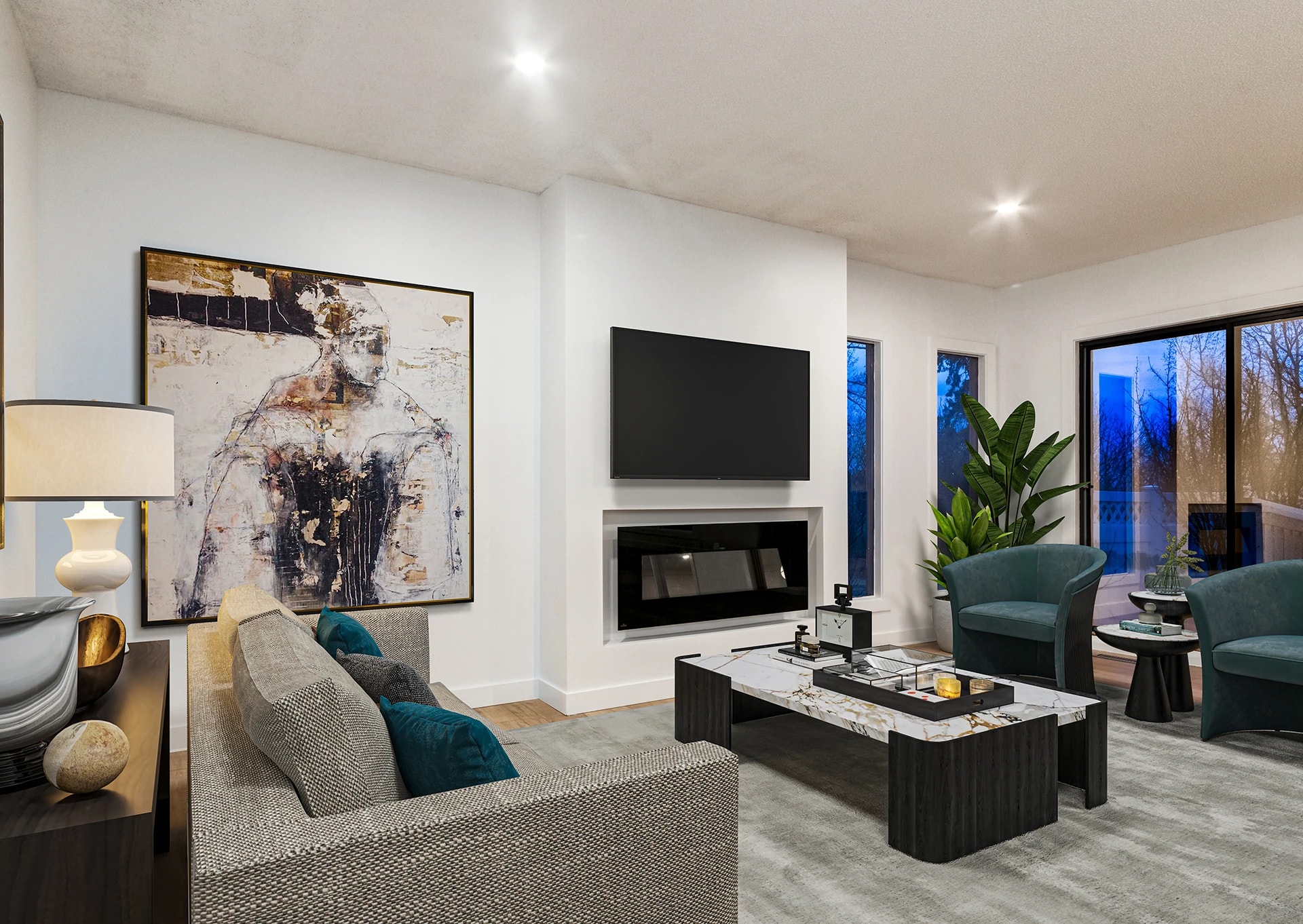 Living room with a linear gas fireplace, statement art, and teal accent chairs