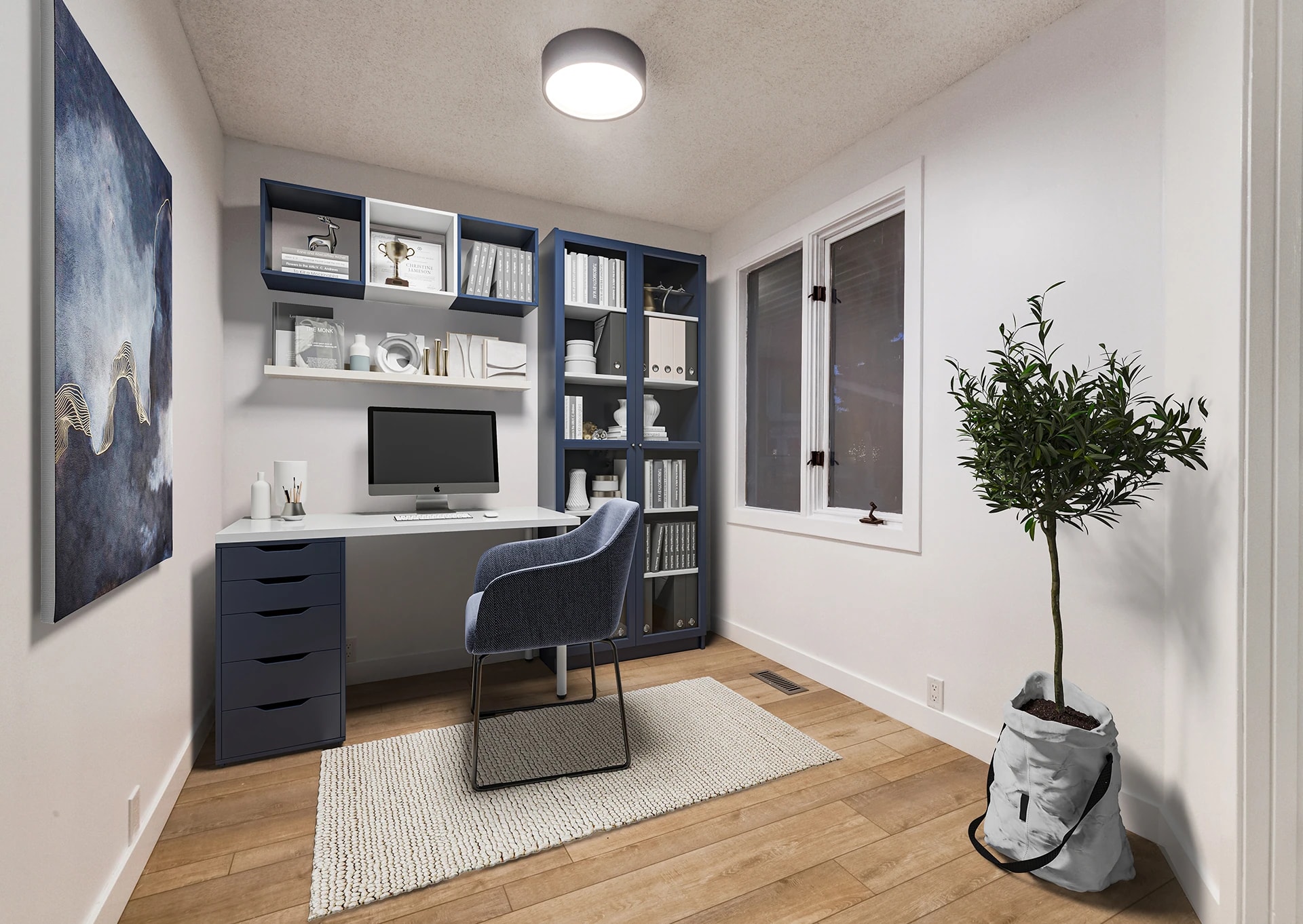 Virtually staged home office nook with blue built-in bookcases and a desk